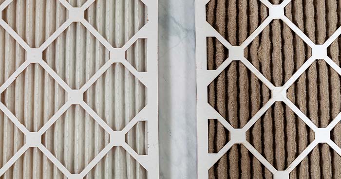 Image: A Dirty And Clean Air Filter Side By Side.