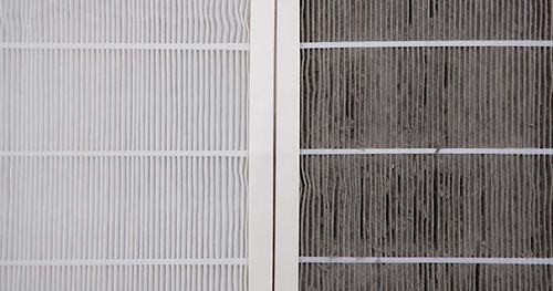 Image: A Clean And Dirty Air Filter Side By Side.