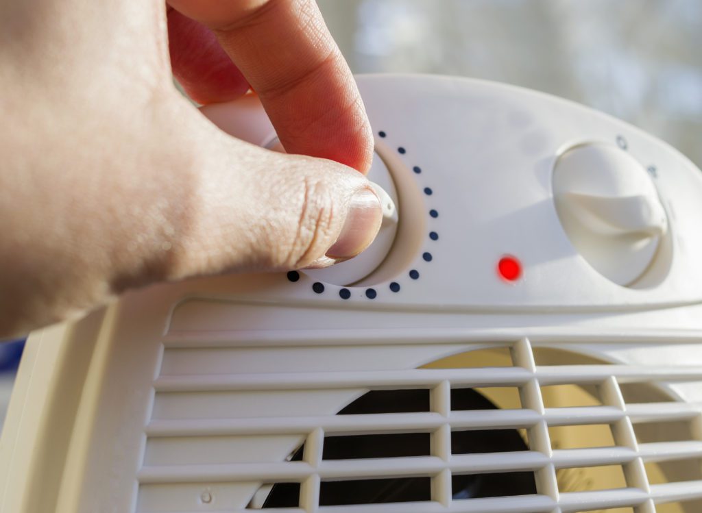 Adjust The Heat On A Space Heater