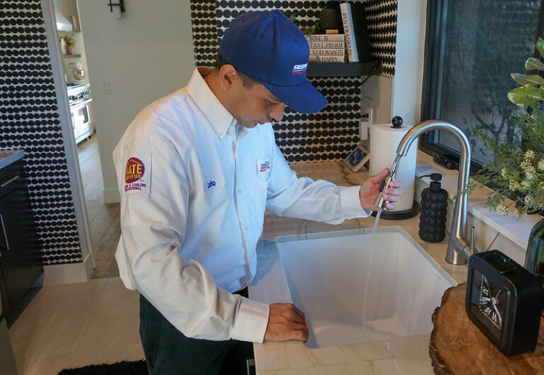 Tech at a sink