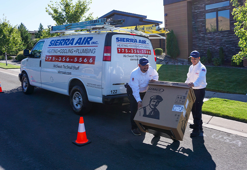 Technicians Unloading Delivering Ac Unit (3)
