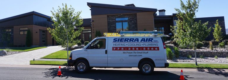 Sierra Air service van parked outside a modern Reno, NV home on a clear, hot summer day