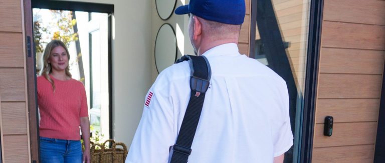 Reno homeowner welcoming a Sierra Air technician to her front door for an indoor air quality assessment